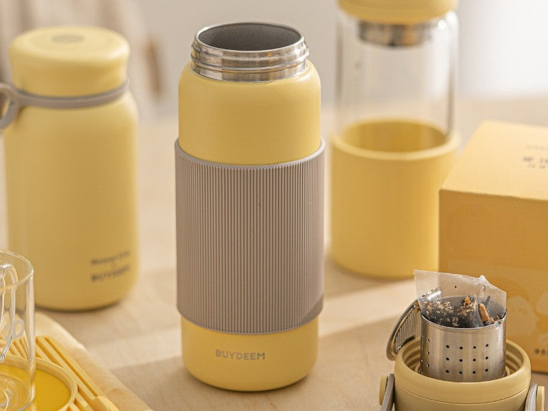 Buydeem Isolierkanne CD1011 mit Sieb 400 ml Pastellgelb